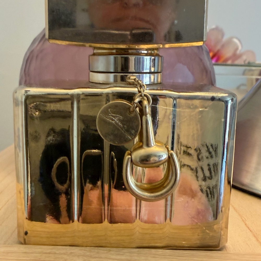 Gucci Gold-tone Accent Bottle with Charm